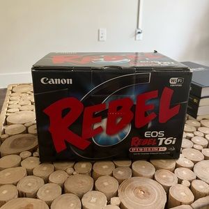 CANON REBEL EOS T6i. Never found the opportunity to use this but it is brand new